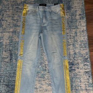 Homme femme blue jeans gold details never worn 34 waist 32